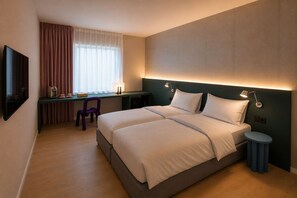 In-room safe, desk, laptop workspace, blackout curtains - Hôtel Les Loges (Vernier)