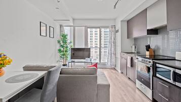 Junior Apartment, 1 Bedroom, Balcony, City View | Private kitchen | Full-sized fridge, microwave, stovetop, dishwasher