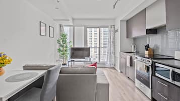 Junior Apartment, 1 Bedroom, Balcony, City View | Private kitchen | Full-size fridge, microwave, stovetop, dishwasher