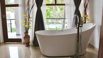 Deluxe Double Room, Balcony, Pool View | Bathroom | Free toiletries, hair dryer, towels, soap