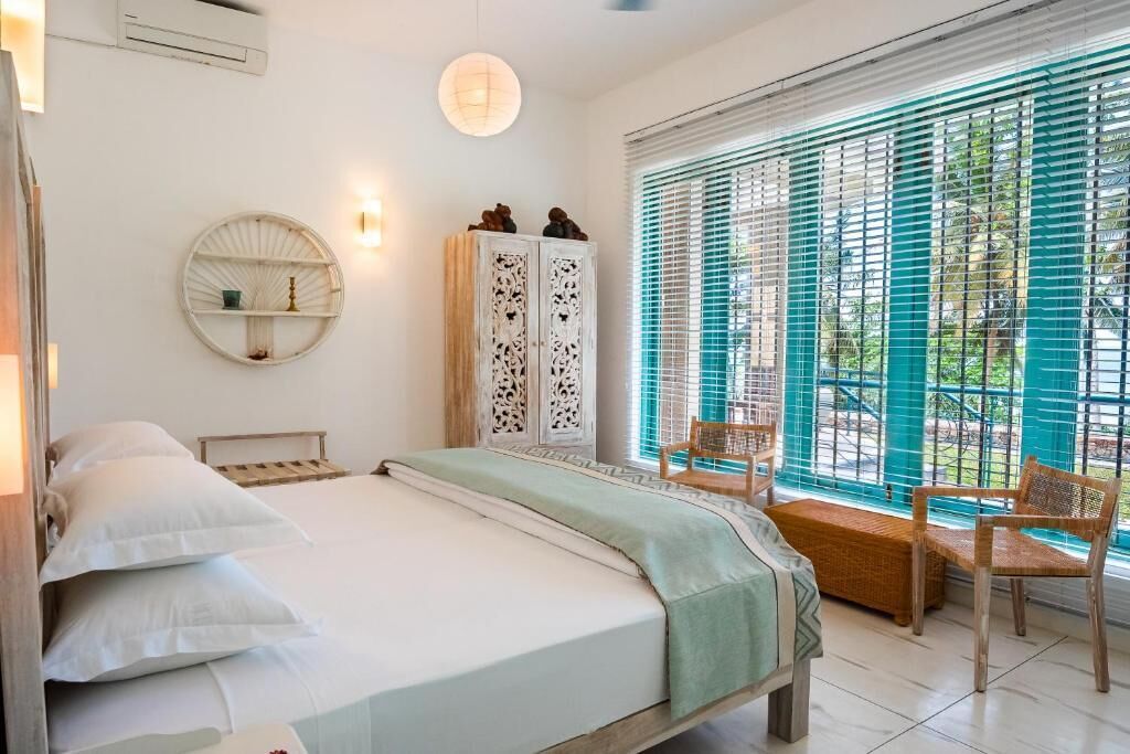 Habitación cuádruple familiar, vistas al mar | Caja fuerte, wifi gratis, ropa de cama