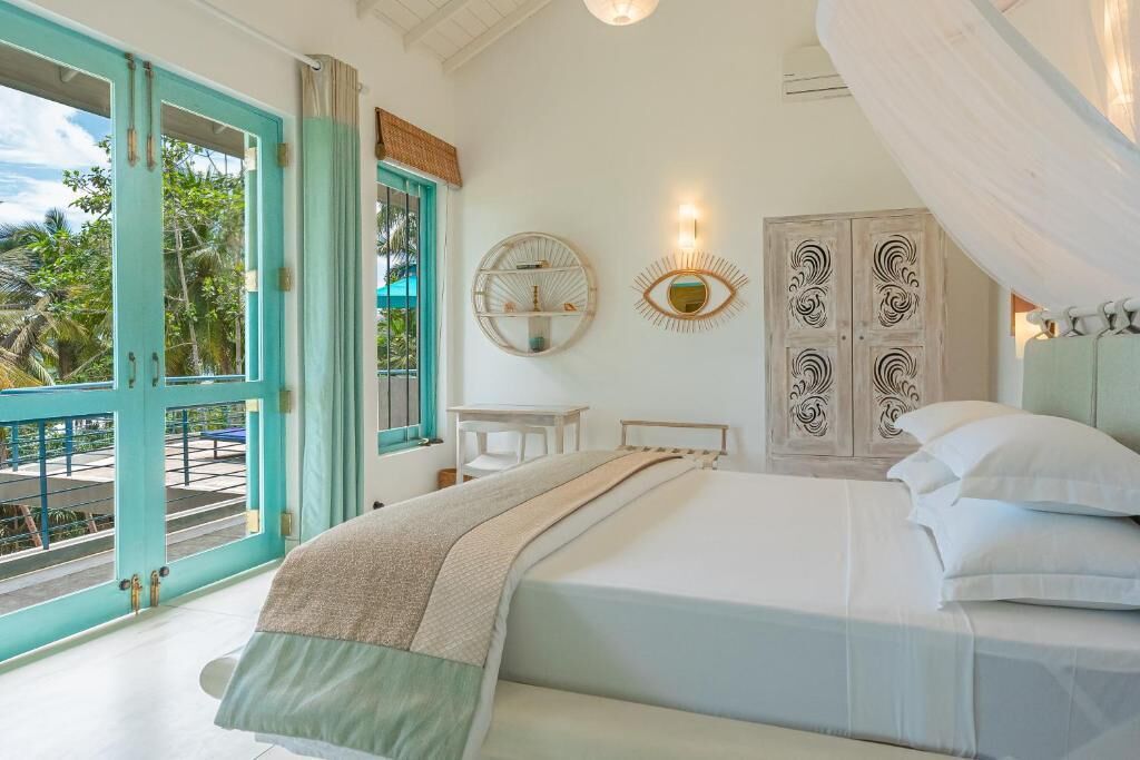 Habitación estándar doble, vistas a la playa | Caja fuerte, wifi gratis, ropa de cama
