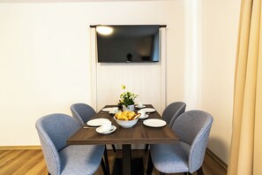 Superior Condo, 2 Bedrooms, Kitchen, Garden View | Dining - Hotel Haus am Meer Kühlungsborn (Kuehlungsborn)