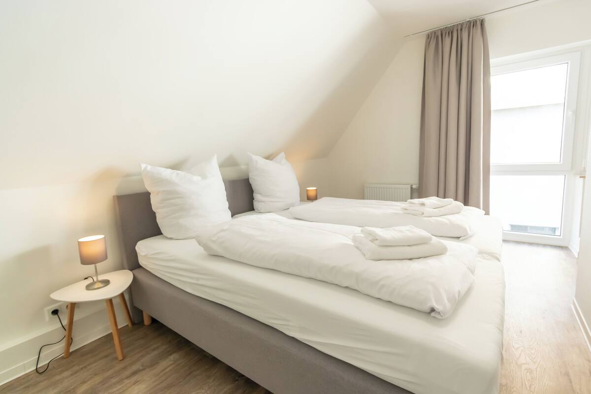 Superior-lejlighed - flere senge - køkken - udsigt til have | Premium-sengetøj, individuelt design, individuel indretning, weekendseng