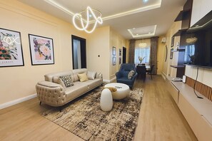 Apartament familiar, balcó, vistes a la ciutat | Sala d'estar