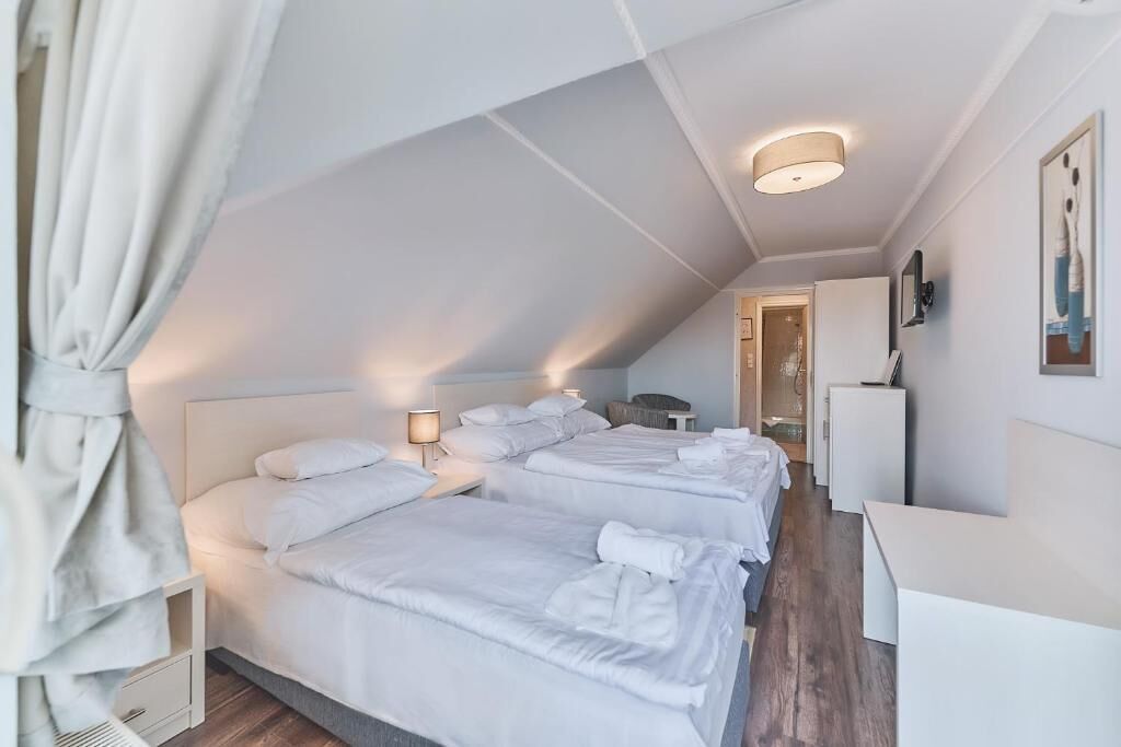 Standard Triple Room, Balcony | In-room safe, free WiFi