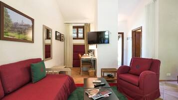 Comfort-Doppel- oder -Zweibettzimmer, Terrasse, Gartenblick | Wohnbereich