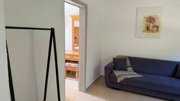 Superior Apartment, Sea View | Living area