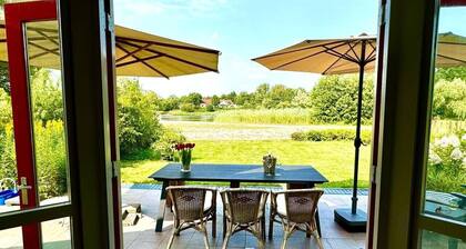 Vrijstaande recreatiewoning direct aan het strand