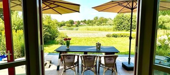 Vrijstaande recreatiewoning direct aan het strand