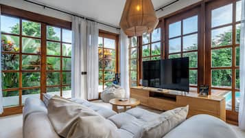 Panoramic Villa, Pool View | Living area | 50-inch Smart TV with digital channels