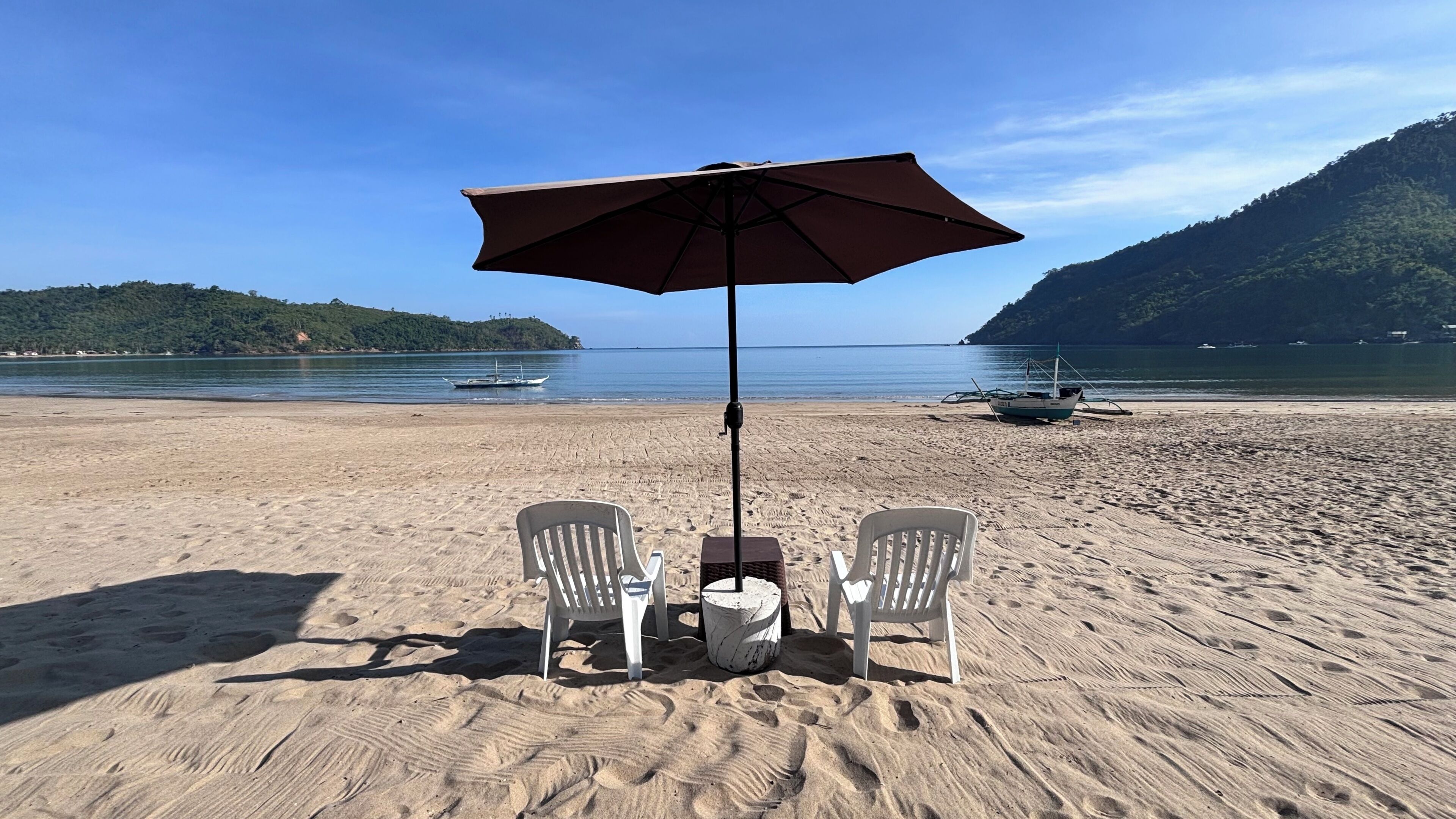 On the beach, sun-loungers, beach umbrellas, beach towels