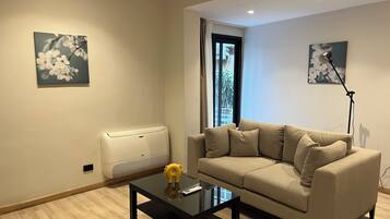 Deluxe Apartment, 1 Bedroom, Balcony, City View | Living area