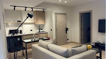 Deluxe Apartment, 1 Bedroom, Balcony, City View | Living area