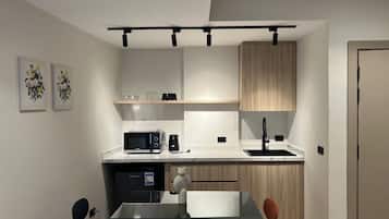 Deluxe Apartment, 1 Bedroom, Balcony, City View | Living area