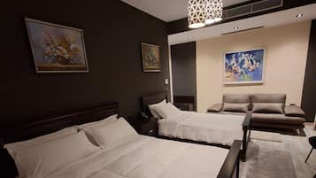 Deluxe Quadruple Room, Mountain View | Select Comfort beds, minibar, desk, soundproofing