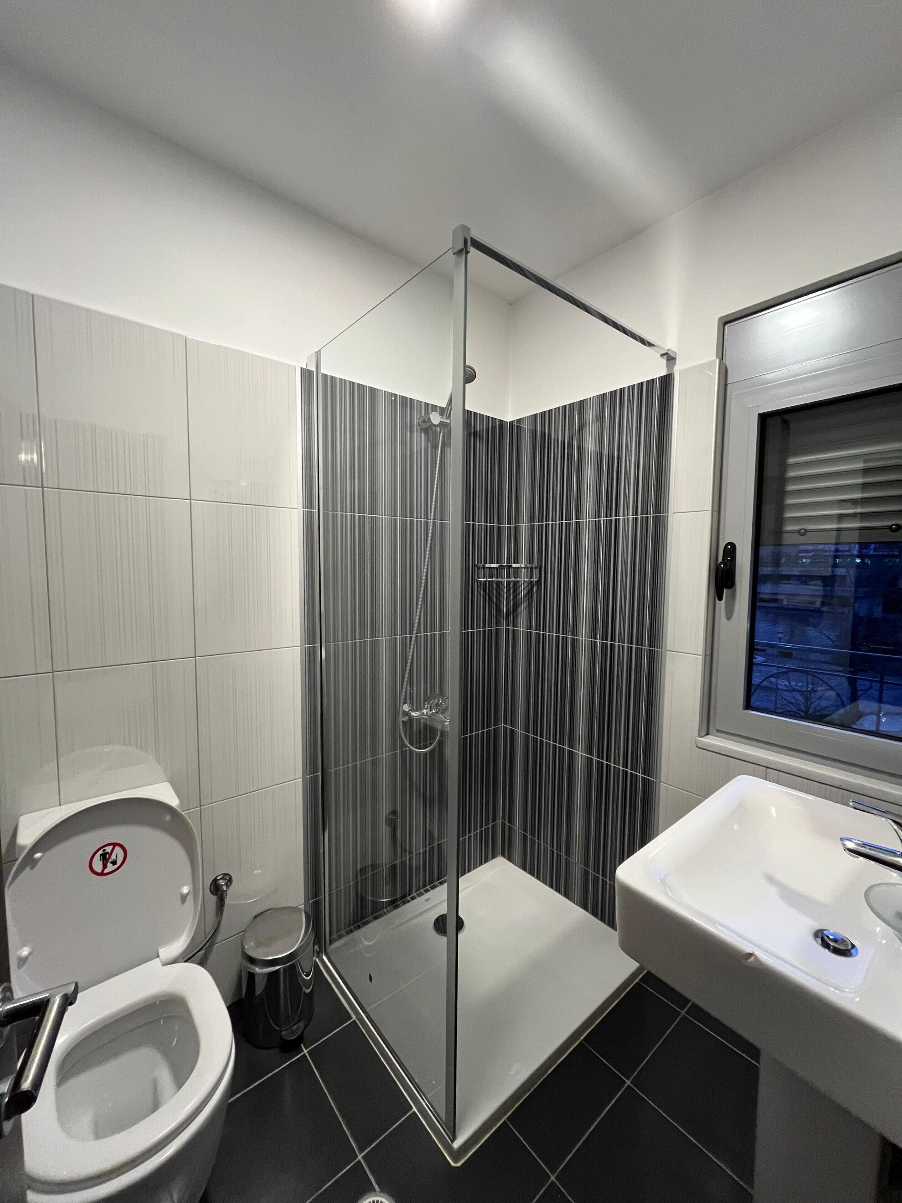 Comfort Double or Twin Room, Garden View | Bathroom | Shower, free toiletries, hair dryer, slippers