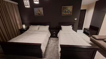 Deluxe Quadruple Room, Mountain View | Select Comfort beds, minibar, desk, soundproofing