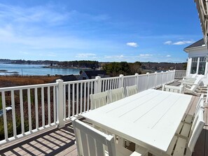 Outdoor dining - The Hill is a Luxury 5-bedroom retreat with panoramic ocean views from almost every room, just 0.2 miles from Cape Neddick Beach. One-level living with ramp access, roll-in showers, and grab bars makes it ideal for multigenerational beach stays. (Cape Neddick)