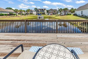Outdoor dining - Relax and enjoy this beach themed condo only a few blocks from the ocean (Myrtle Beach)