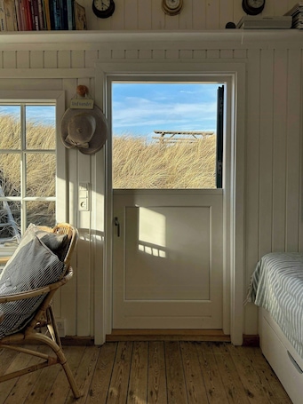 Room. Beach house in the dunes at Tornby Strand