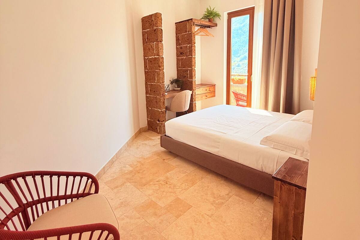 Deluxe Room, Hill View | In-room safe, desk, laptop workspace, soundproofing