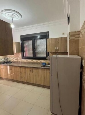 Private kitchen - Apartment 11 - Spacious and ideally located in the heart of the city (Saidia)