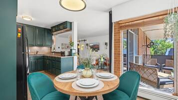 Apartment, Multiple Beds, Balcony, Garden View (The Aviary Near CSU) | Dining