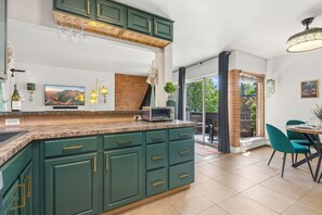 Apartment, Multiple Beds, Balcony, Garden View (The Aviary Near CSU) | Private kitchen - The Aviary Near CSU Pool, Sauna, and Gym (Fort Collins)