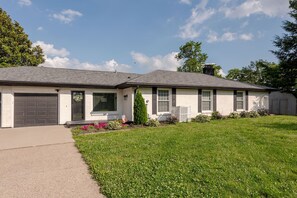 A single-story house with a garage, a front porch, and a well-maintained lawn. - Welcome to Skyline Point ~ Louisville Skyline (Floyds Knobs)