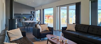 Moderna cabaña junto al lago con spa en Barken
