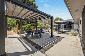 Outdoor dining - Your Denver Oasis: Four Bedrooms + Lush, Relaxing Backyard Awaits! (Denver)