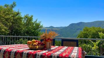 Classic Triple Room, Garden View | Outdoor dining