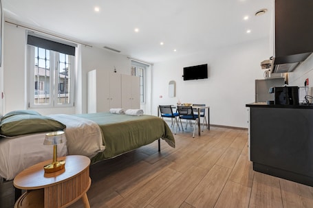 WiFi, bed sheets. Studio Apartment 'Monolocale Red' with Wi-Fi and Air Conditioning