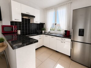 Fridge, microwave, coffee/tea maker