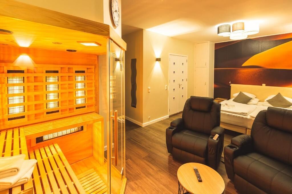 Deluxe suite, sauna, uitzicht op tuin | Een kluis op de kamer, gratis wifi