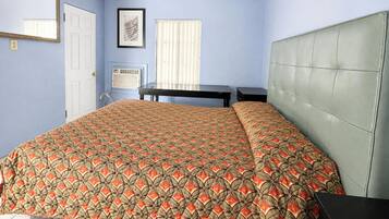 Room, 1 King Bed, Smoking, Kitchenette | Desk, iron/ironing board (on request), WiFi (free), bed sheets