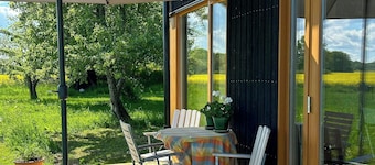 Small house amongst apple trees near VĂ€ttern