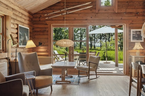 Nordic log cabin with views over the fields