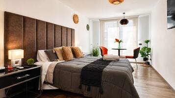 Superior Apartment | Premium bedding, down comforters, blackout drapes, iron/ironing board