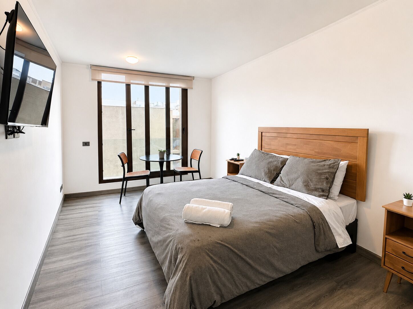Standard Apartment | Premium bedding, down duvets, blackout curtains, iron/ironing board