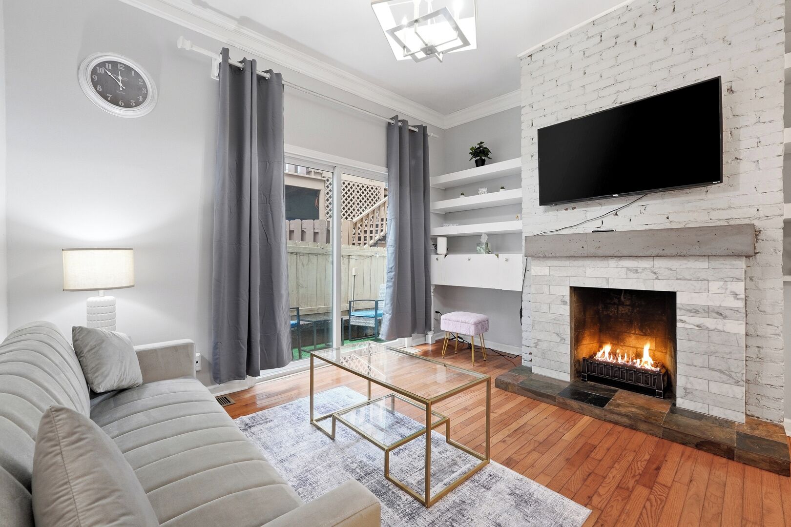 Smart TV, fireplace, books