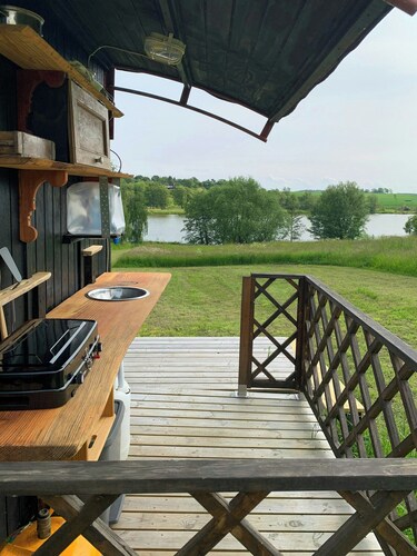 Wagon with view over Lake Ollerup