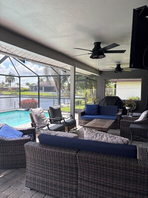 Outdoor pool, a heated pool - Pet friendly house with heated pool on Lotus Canal. (Cape Coral)