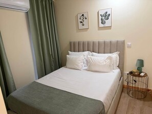 1 dormitorio, tabla de planchar con plancha, wifi gratis y ropa de cama