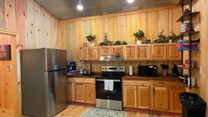 Private kitchen - A beautiful  baby friendly family cabin offers two bedrooms and two full baths (Caddo Gap)