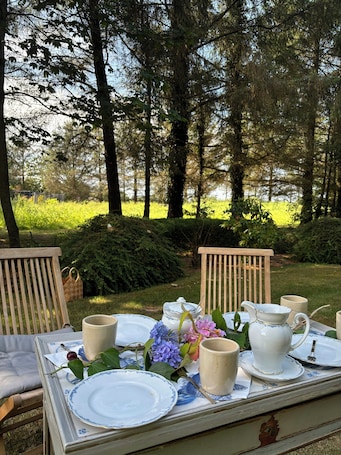 Outdoor dining. Stylish living in the historic Friesenstuben