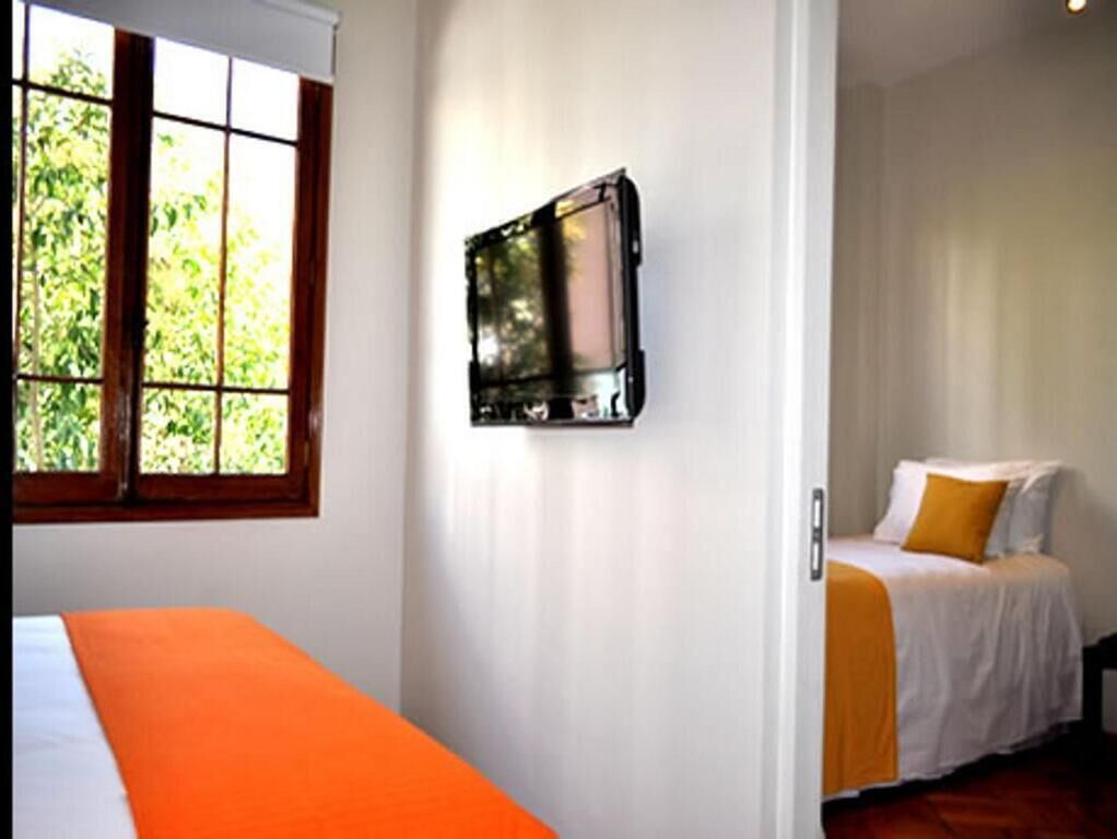 Chambre triple supérieure | Coffre-fort, accès au Wi-Fi (inclus)