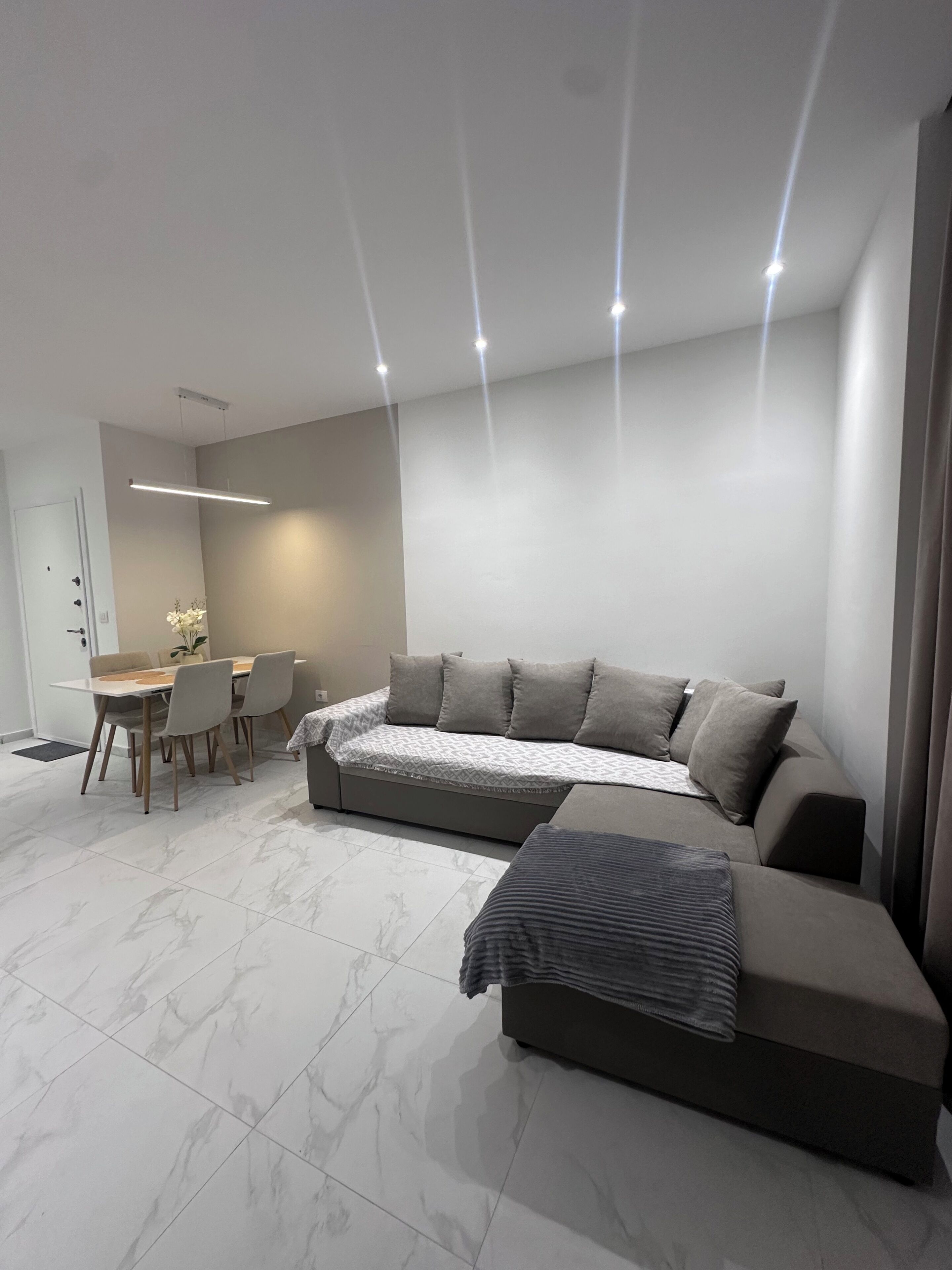 Family Apartment, Balcony | Living area | 100-cm Smart TV with digital channels