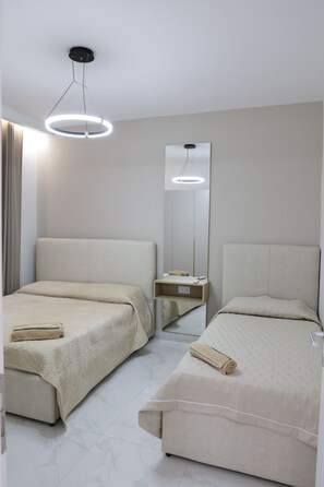 Appartement Familial, balcon | Chambres insonorisées, fer et planche à repasser, Wi-Fi gratuit